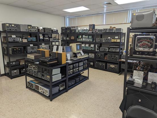 Left side of the museum with racks of radio and computer equipment.