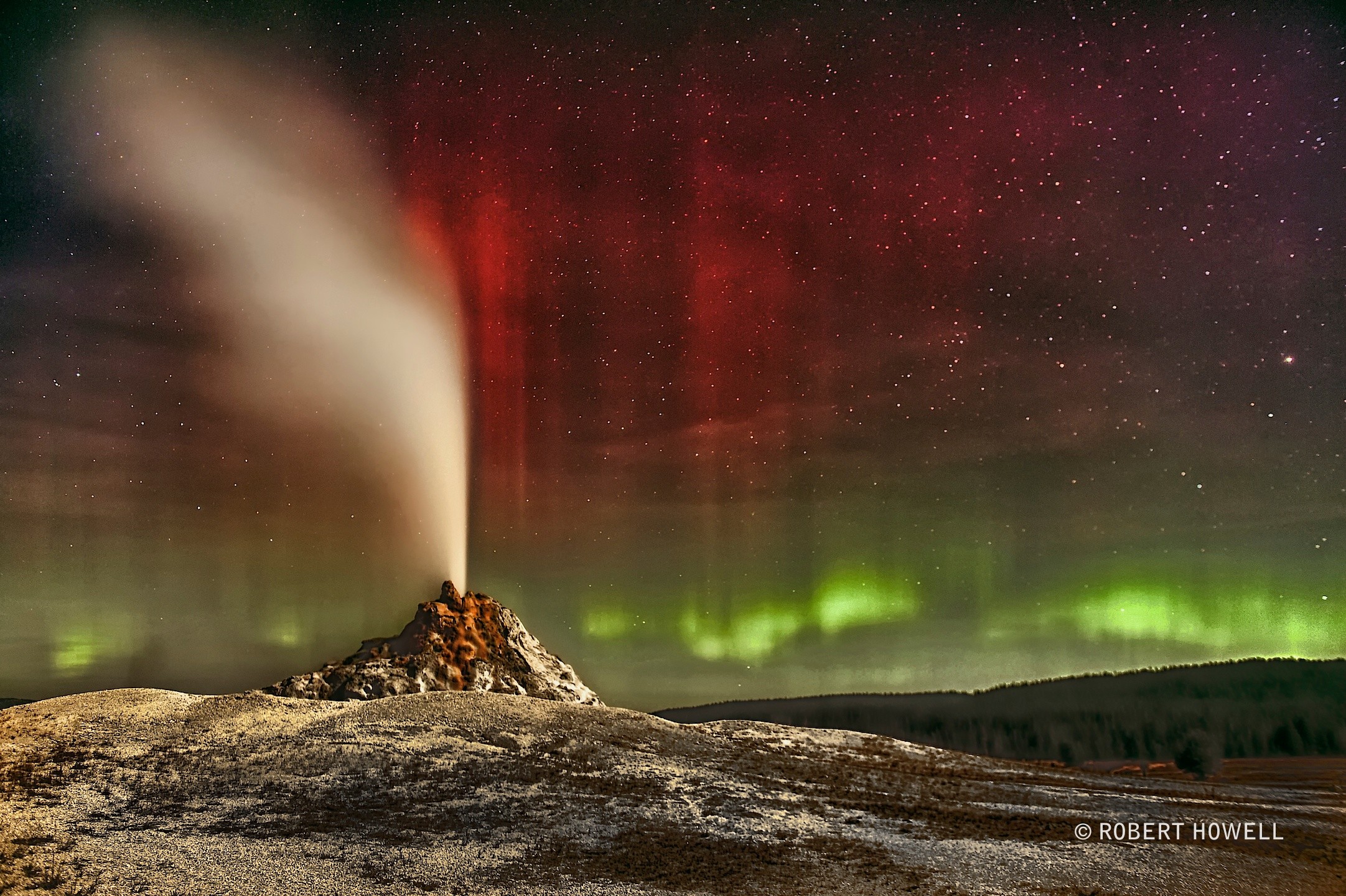2022 February 20
The featured image shows White Dome geyser erupting in Yellowstone National Park with colorful aurora in the background. 

Aurora Over White Dome Geyser
 * Image Credit & Copyright: Robert Howell

Explanation: 
Sometimes both heaven and Earth erupt. Colorful auroras erupted unexpectedly a few years ago, with green aurora appearing near the horizon and brilliant bands of red aurora blooming high overhead. A bright Moon lit the foreground of this picturesque scene, while familiar stars could be seen far in the distance. With planning, the careful astrophotographer shot this image mosaic in the field of White Dome Geyser in Yellowstone National Park in the western USA. Sure enough, just after midnight, White Dome erupted -- spraying a stream of water and vapor many meters into the air. Geyser water is heated to steam by scalding magma several kilometers below, and rises through rock cracks to the surface. About half of all known geysers occur in Yellowstone National Park. Although the geomagnetic storm that caused the auroras subsided within a day, eruptions of White Dome Geyser continue about every 30 minutes. 

Authors & editors: Robert Nemiroff (MTU) & Jerry Bonnell (UMCP)
NASA Official: Phillip Newman Specific rights apply.
NASA Web Privacy Policy and Important Notices
A service of: ASD at NASA / GSFC
& Michigan Tech. U.
