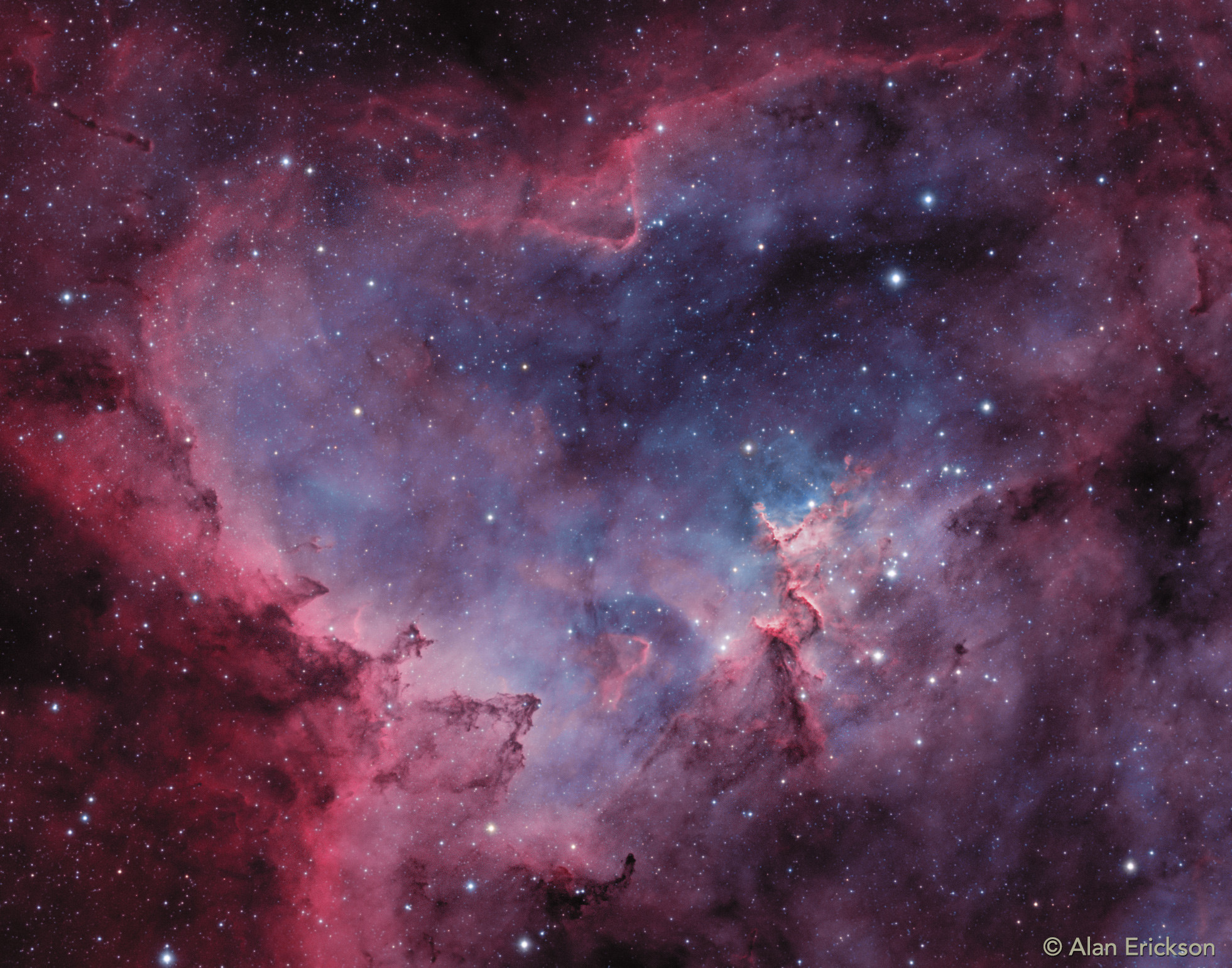 2018 February 14

In the Heart of the Heart Nebula
 * Credit & Copyright: Alan Erickson

Explanation: 
What's that inside the Heart Nebula? First, the large emission nebula dubbed IC 1805 looks, in whole, like a human heart. It's shape perhaps fitting of the Valentine's Day, this heart glows brightly in red light emitted by its most prominent element: hydrogen. The red glow and the larger shape are all created by a small group of stars near the nebula's center. In the heart of the Heart Nebula are young stars from the open star cluster Melotte 15 that are eroding away several picturesque dust pillars with their energetic light and winds. The open cluster of stars contains a few bright stars nearly 50 times the mass of our Sun, many dim stars only a fraction of the mass of our Sun, and an absent microquasar that was expelled millions of years ago. The Heart Nebula is located about 7,500 light years away toward the constellation of the mythological Queen of Aethiopia (Cassiopeia). 

Authors & editors: Robert Nemiroff (MTU) & Jerry Bonnell (UMCP)
NASA Official: Phillip Newman Specific rights apply.
NASA Web Privacy Policy and Important Notices
A service of: ASD at NASA / GSFC
& Michigan Tech. U.
